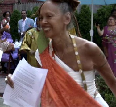 Mama Faybiene dances down the isle at my Auntie's wedding, poetry in hand.